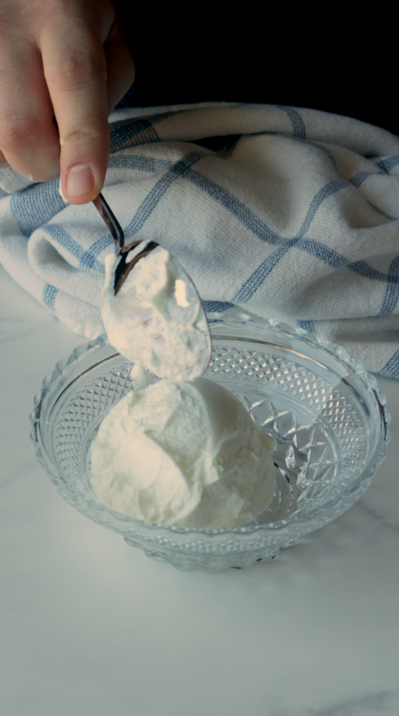 Mix together greek yogurt, minced garlic and dried mint. 